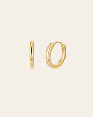 The 15mm Mother Hoops by CAMELLIA, crafted from hypoallergenic 14K yellow gold vermeil, are shown against a plain backdrop. Displayed in both side and front views, these small gold hoop earrings embody elegance and purity with their minimalist design.