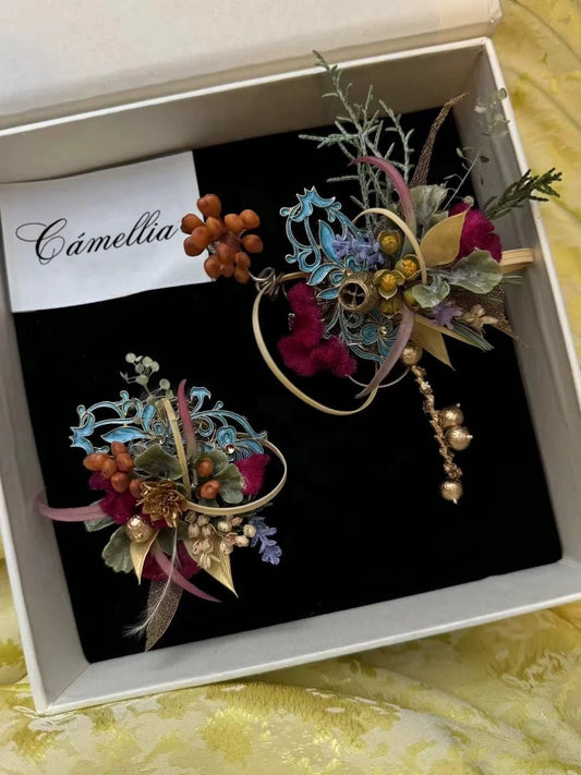 Decorative floral accessories in red, gold, and purple accents featuring customizable handcrafted jewelry in a