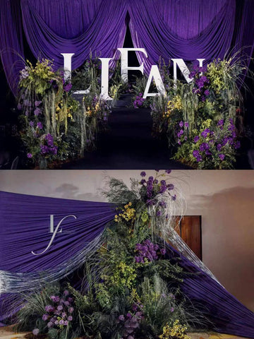 Two floral installations with purple drapery and greenery surround white "LIFAN" letters. The top is dense with flowers, the bottom has fewer blooms, and CAMELLIA's Dreamy Purple Green Wedding Flower Rings add a handcrafted touch to the romantic scene. Two floral installations with purple drapery and greenery surround white "LIFAN" letters. The top is dense with flowers, the bottom has fewer blooms, and CAMELLIA's Dreamy Purple Green Wedding Flower Rings add a handcrafted touch to the romantic scene.