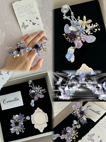 A hand with floral decorations holds a card with text and butterflies. Nearby, a black box labeled "CAMELLIA" reveals Customized Wedding Flower Rings and floral accessories in purple and white. A hand with floral decorations holds a card with text and butterflies. Nearby, a black box labeled "CAMELLIA" reveals Customized Wedding Flower Rings and floral accessories in purple and white.