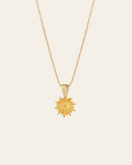 The Elsa Chrysanthemum Citrine Necklace by CAMELLIA features a sunflower-shaped pendant in 14K Gold Vermeil with petal-like details.