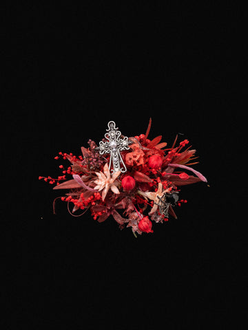 The Romantic Valentines Day Flower Ring by CAMELLIA features a decorative silver cross with red and pink dried flowers on a black background. Handcrafted in New York, it combines natural beauty with meticulous artistry for an elegant contrast. The Romantic Valentines Day Flower Ring by CAMELLIA features a decorative silver cross with red and pink dried flowers on a black background. Handcrafted in New York, it combines natural beauty with meticulous artistry for an elegant contrast.