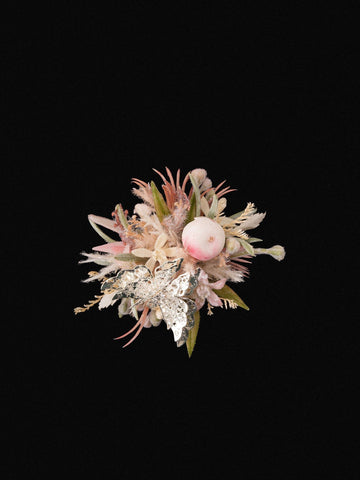 The CAMELLIA Butterfly Flower Ring features a silver butterfly resting on dried preserved flowers and leaves, all handcrafted in New York, set against a black background. The CAMELLIA Butterfly Flower Ring features a silver butterfly resting on dried preserved flowers and leaves, all handcrafted in New York, set against a black background.