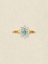 Celeste Topaz Halo Ring