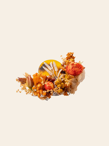 The CAMELLIA Wheat Birth Flower Ring evokes autumn's charm with its handcrafted design, featuring fall hues of orange and yellow reminiscent of a floral arrangement with dried leaves and berries against a light backdrop, all crafted in New York. The CAMELLIA Wheat Birth Flower Ring evokes autumn's charm with its handcrafted design, featuring fall hues of orange and yellow reminiscent of a floral arrangement with dried leaves and berries against a light backdrop, all crafted in New York.