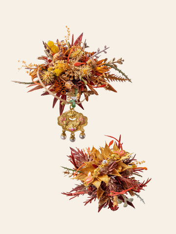 Two Fortune New Chinese Wedding Flower Rings by CAMELLIA feature intricate autumnal floral arrangements, one with a decorative golden embellishment with three dangling elements, custom handcrafted in New York for an elegant touch. Two Fortune New Chinese Wedding Flower Rings by CAMELLIA feature intricate autumnal floral arrangements, one with a decorative golden embellishment with three dangling elements, custom handcrafted in New York for an elegant touch.