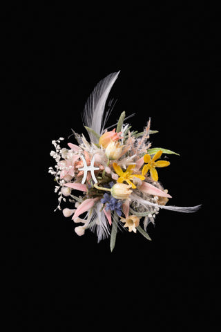 A vibrant bouquet of mixed flowers and feathers, with pink, yellow, and white petals on a black background, resembles the Pisces Flower Ring by CAMELLIA—a handcrafted masterpiece capturing the essence of beauty like a custom symbol flower ring designed in New York. A vibrant bouquet of mixed flowers and feathers, with pink, yellow, and white petals on a black background, resembles the Pisces Flower Ring by CAMELLIA—a handcrafted masterpiece capturing the essence of beauty like a custom symbol flower ring designed in New York.