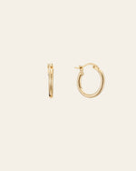 CAMELLIA's Infinite Hoops, crafted in 14K Yellow Gold Vermeil, are hypoallergenic. Displayed on a plain background in front and side views, these earrings highlight their simple, circular design for elegant ease.