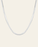 The CAMELLIA 3.5 mm Snake Chain Necklace is elegantly displayed against a plain white background, providing a hypoallergenic touch for sensitive skin.