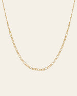 The Isla Chain Necklace by CAMELLIA is crafted in radiant 14K Yellow Gold Vermeil, showcasing stunning alternating long and short links set against a plain light background.