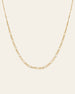The Isla Chain Necklace by CAMELLIA is crafted in radiant 14K Yellow Gold Vermeil, showcasing stunning alternating long and short links set against a plain light background.