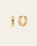 The CAMELLIA Starburst Cz Hoops are 14K Yellow Gold Vermeil earrings with star engravings on a plain background, crafted on a sterling silver base. They're hypoallergenic for comfort.