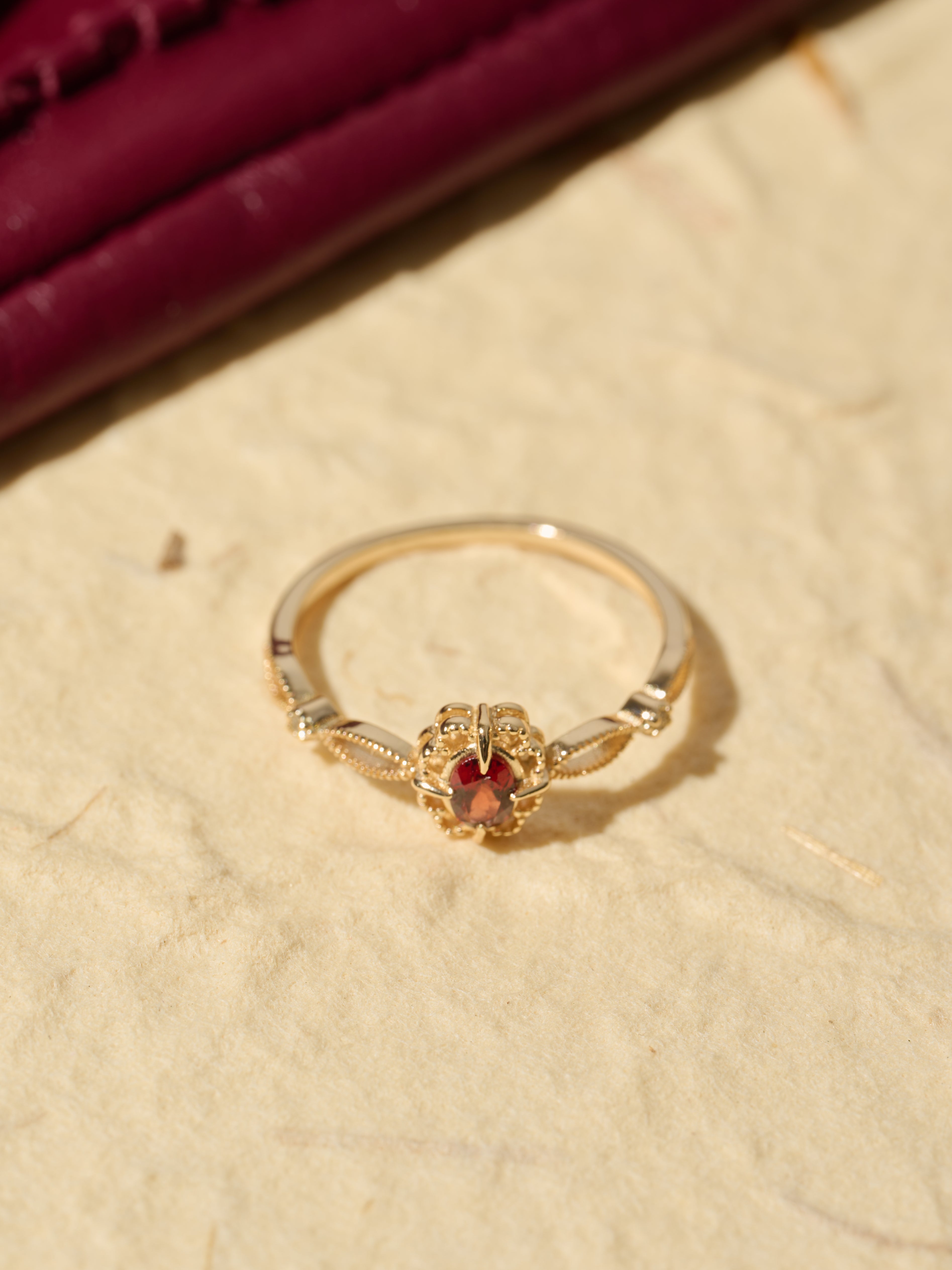 Regal Rosette Garnet Ring