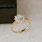 Celeste Topaz Halo Ring
